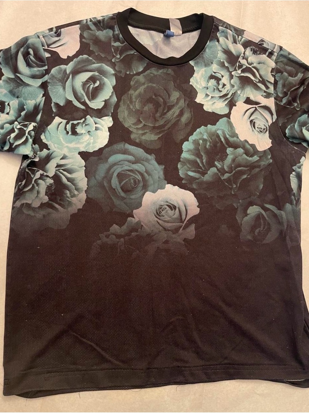 Black and blue rose print mesh jersey in a S